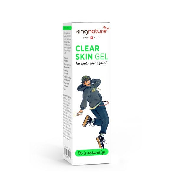 Eine weiße Packung Kingnature Clear Skin Gel zeigt eine tanzende Person in Freizeitkleidung. Die Verpackung ziert die Aufschrift „Clear Skin Gel“, „Nie wieder Pickel!“ und „Natürlich!“. Das Swiss Made-Logo steht für vertrauenswürdige Qualität.